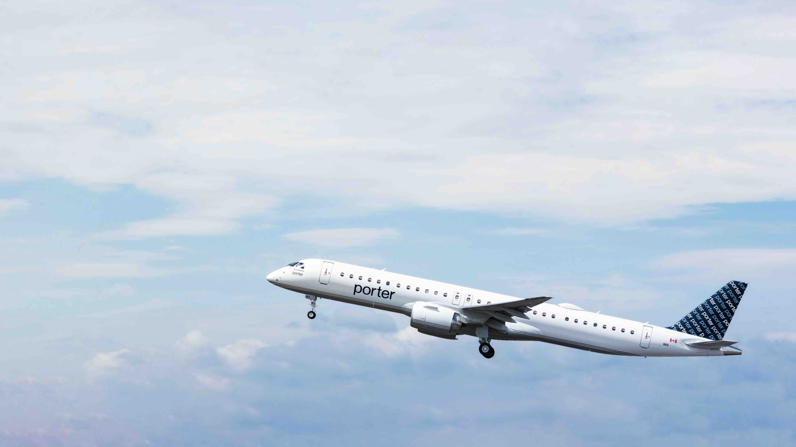 Porter Arilines plane in flight Porter Airlines Caribbean Flights copy